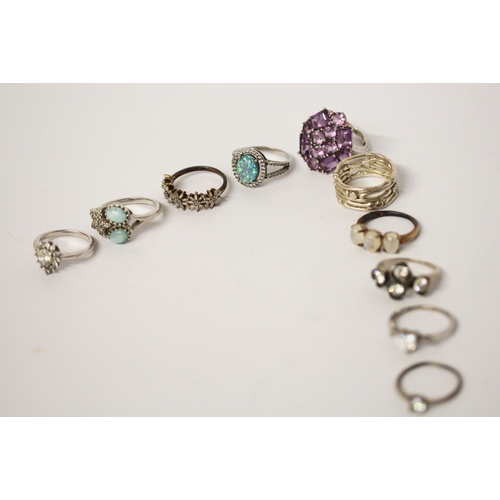 695 - A collection of silver ladies stone set dress rings