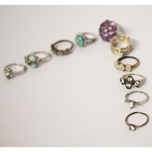 695 - A collection of silver ladies stone set dress rings