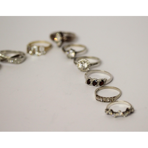 696 - A collection of silver ladies stone set dress rings