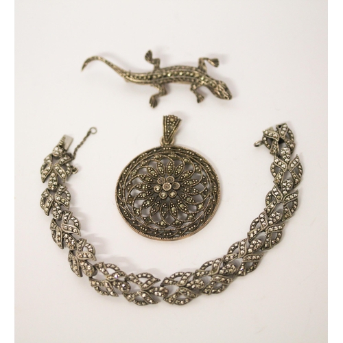 699 - Vintage and marcasite bracelet, lizard brooch and a circular pendant