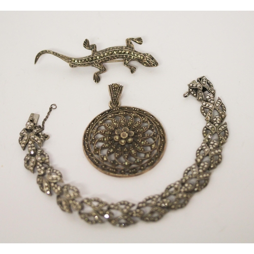 699 - Vintage and marcasite bracelet, lizard brooch and a circular pendant