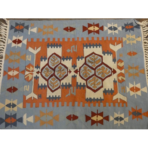 152 - A small blue and patterned Kilim style rug, 3'8 x 3'