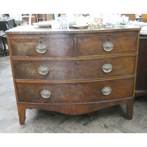 126 - Georgian mahogany bow front chest of two long and two short drawers standing on splayed bracket feet... 