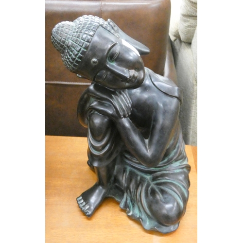 134 - A large Thai Buddha bronze effect figure ornament