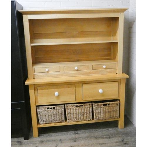 173 - A modern light oak kitchen style dresser with shelf back fitted three drawers, standing on table sty... 