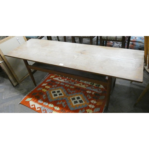 161 - A 1960's/70's long teak coffee table with under tier, 5' long