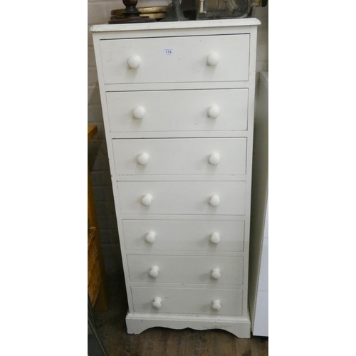 174 - A cream painted pine tallboy chest of seven drawers, 19 1/2