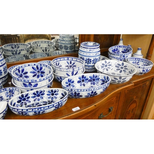 225 - A large quantity of Brazilian blue and white porcelain to include bowls, jars, jugs etc