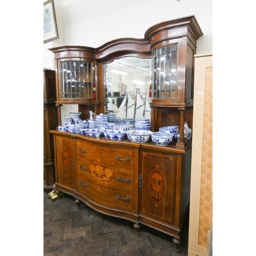 226 - An early 20th century Italian marquetry inlaid shaped front sideboard cabinet with glazed cabinet an... 