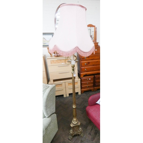 253 - A gilt wood standard lamp with pink shade