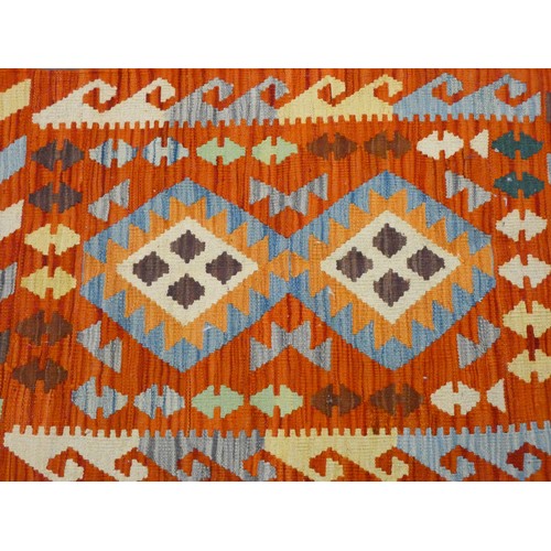 157 - Two small patterned Kilim style wool pile rugs, each approx 3' x 2'