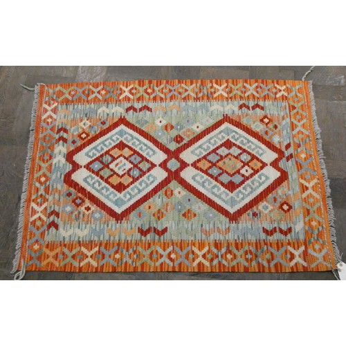 158 - An orange and patterned Kilim style wool pile rug, 4' x 2'10