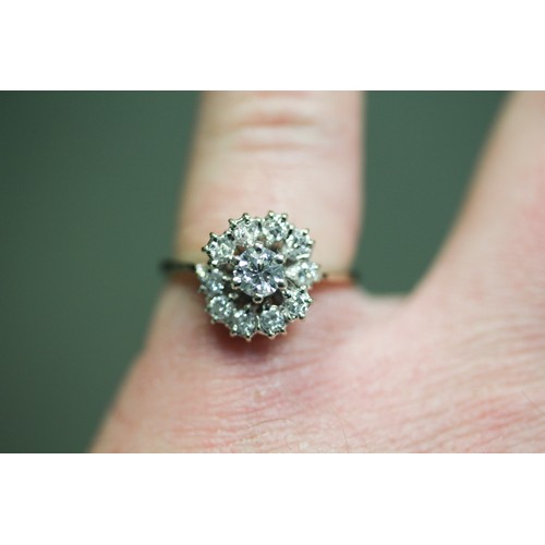 589 - Diamond cluster ring, mid-century setting in an off set design, unmarked white gold, ring size M