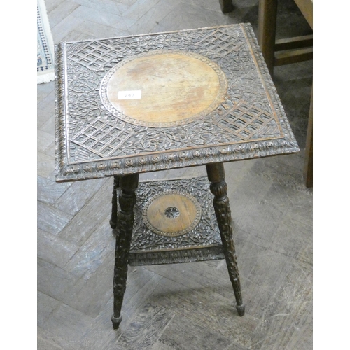 249 - A two tier square carved hardwood occasional table