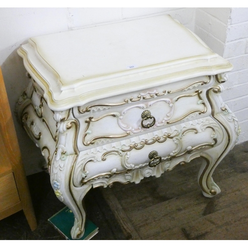 266 - An Italian style cream and gilt decorated chest of two drawers on cabriole style legs, 2'3 wide