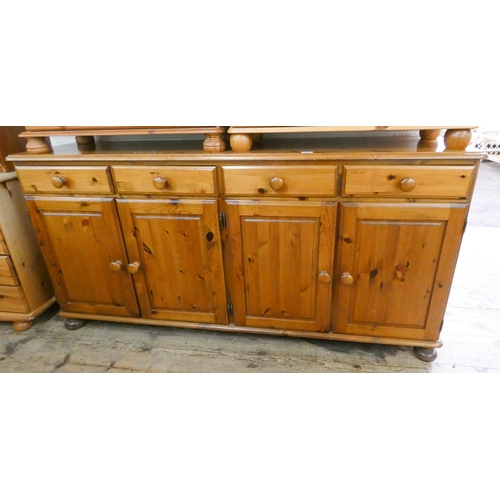 273 - A modern pine sideboard fitted four drawers and cupboards, 5'8 wide