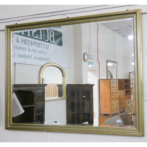 280A - A very large bevelled wall mirror in gilt frame, 39