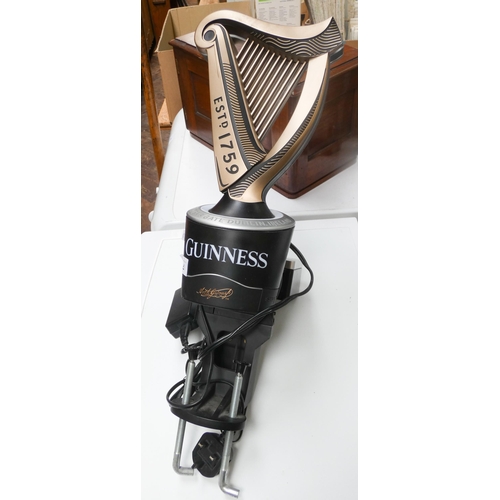 285 - A large illuminated Guinness advertising bar mounted ornament