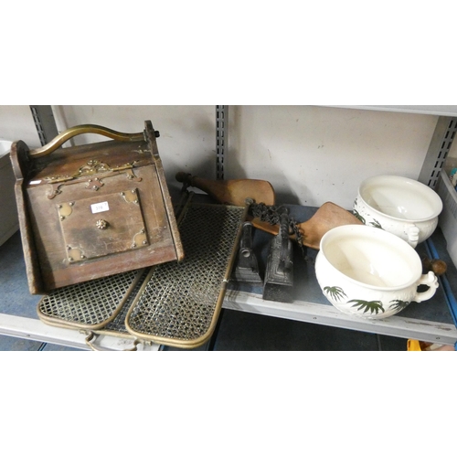 376 - A brass spark guard, coal scuttle, two heavy irons, two pots and a yoke