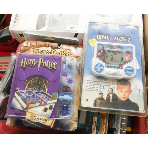 390 - A large quantity of assorted children's electronic games including Little Mermaid, Goosebumps, Harry... 