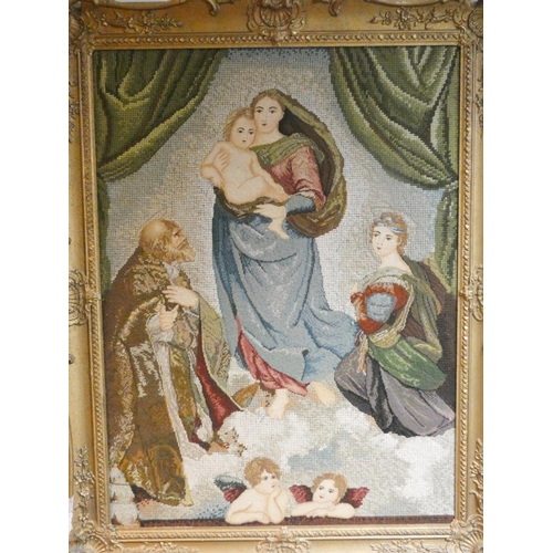 293 - A large petit point and gross point needlework tapestry picture depicting The Virgin and Child in a ... 