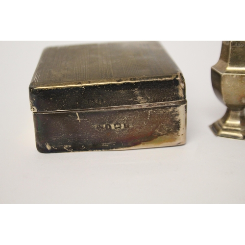 501 - A silver covered cigarette box and a silver pepperette