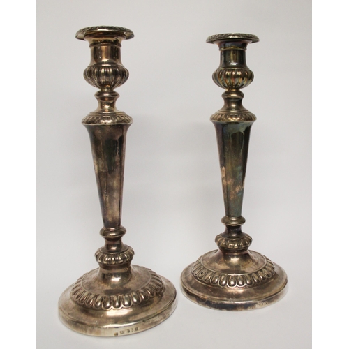 503 - A pair of William IV silver candlesticks, Sheffield 1814/ 1815 . Height 31 cms with weighted bases a... 