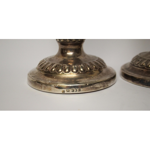 503 - A pair of William IV silver candlesticks, Sheffield 1814/ 1815 . Height 31 cms with weighted bases a... 