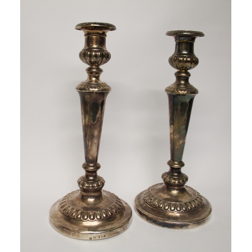 503 - A pair of William IV silver candlesticks, Sheffield 1814/ 1815 . Height 31 cms with weighted bases a... 