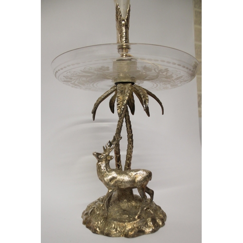 507 - A Victorian silver plated table centrepiece epergne. The silver-plated base modelled as a deer benea... 