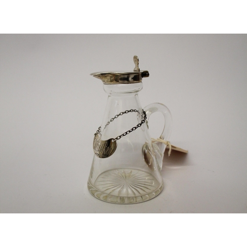 508 - A whisky tot with silver lid and silver decanter label