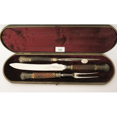 509 - A Victorian country house carving set, with antler handles, the steel blades stamped W Angus, 27 & 2... 