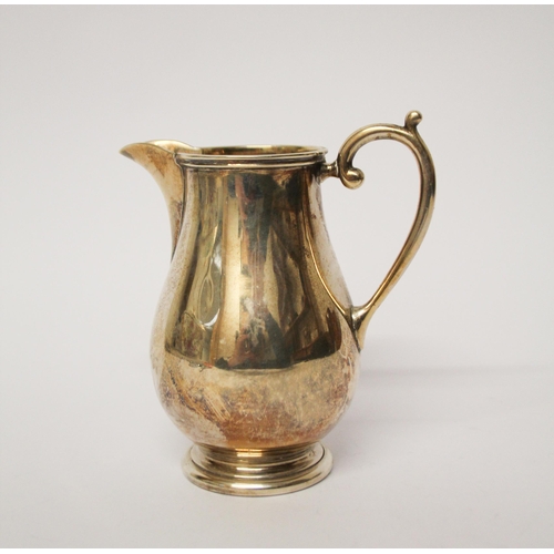 521 - A silver cream jug of plain form, Goldsmiths & Silversmiths Co,  London marks 1928, 4.75 troy ounces... 