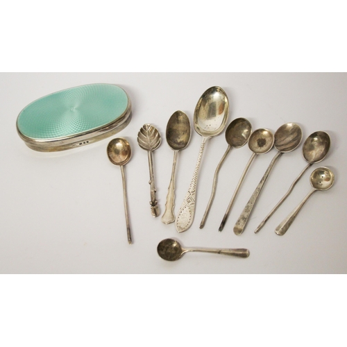 524 - A collection of assorted silver tea spoons and a silver oval enamel dressing table jar lid.