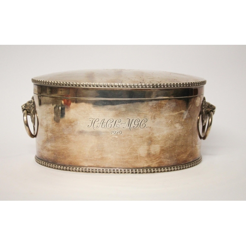 525 - A silver oval biscuit box, quite plain with simple beaded borders, stand-away hinged cover and well-... 