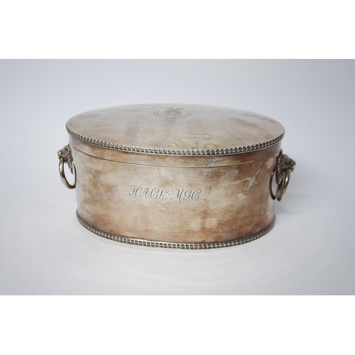 525 - A silver oval biscuit box, quite plain with simple beaded borders, stand-away hinged cover and well-... 