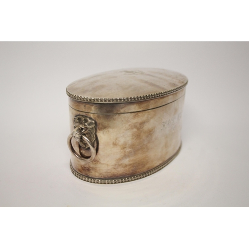 525 - A silver oval biscuit box, quite plain with simple beaded borders, stand-away hinged cover and well-... 