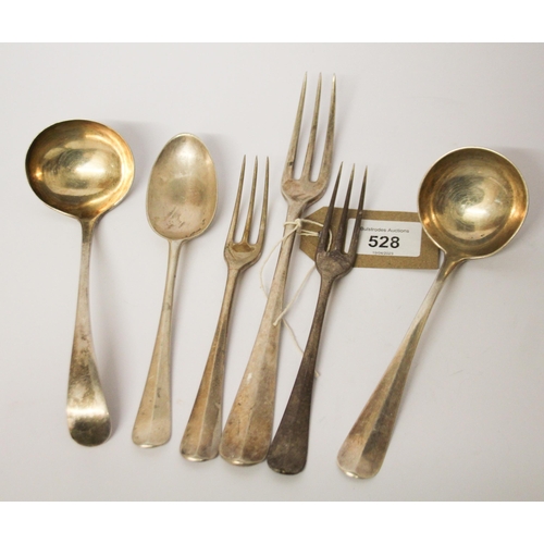 528 - Silver flatware - Two silver rat tail sauce ladles, dessert spoon, table fork and two dessert forks,... 