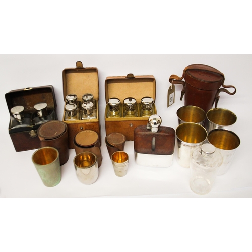 533 - A collection of vintage leather cased tot and drinks sets, with silver plated beakers, leather clad ... 