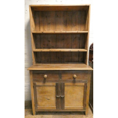 61 - A stripped and waxed pine kitchen dresser with drawer and cupboards under, 3'6 wide