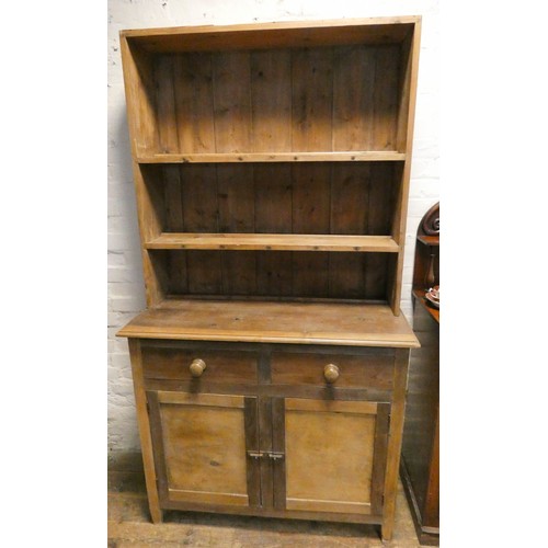 61 - A stripped and waxed pine kitchen dresser with drawer and cupboards under, 3'6 wide