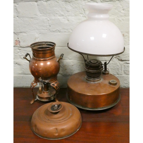 153 - A copper oil lamp with white shade, copper spirit samovar and a water bottle