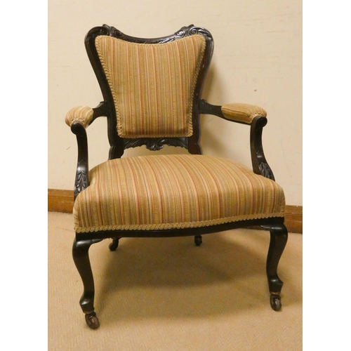 187 - An Edwardian mahogany framed elbow chair on cabriole legs with upholstered seat back and arms