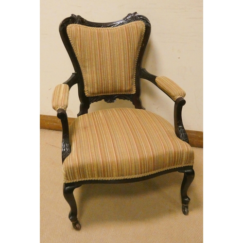 187 - An Edwardian mahogany framed elbow chair on cabriole legs with upholstered seat back and arms