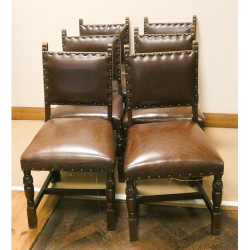 188 - A set of six oak dining chairs with leather upholstered seats and backs