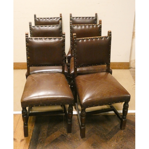 188 - A set of six oak dining chairs with leather upholstered seats and backs