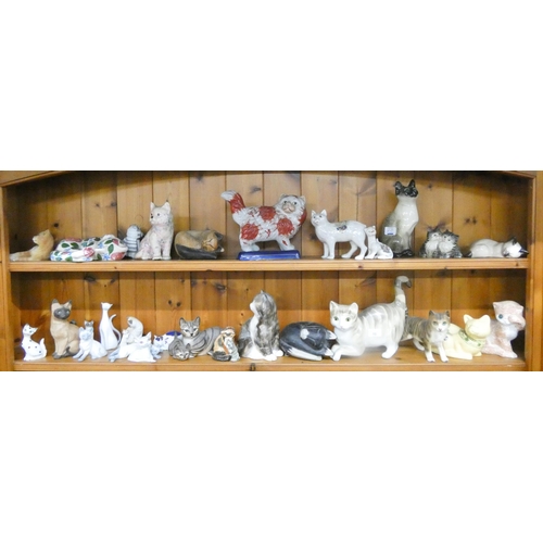 10 - A collection of assorted cat ornaments