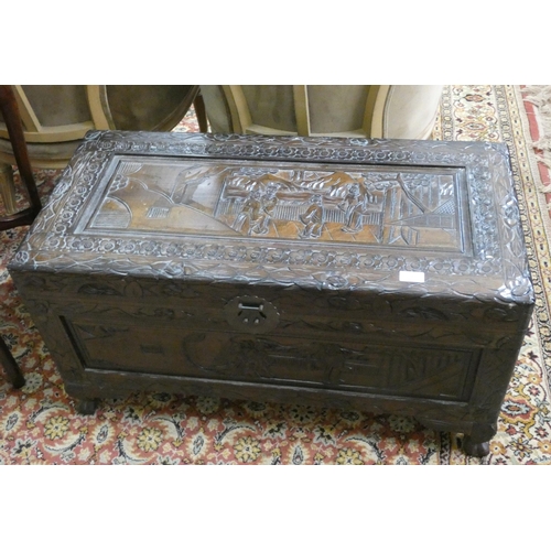 118 - A small carved camphor wood blanket chest