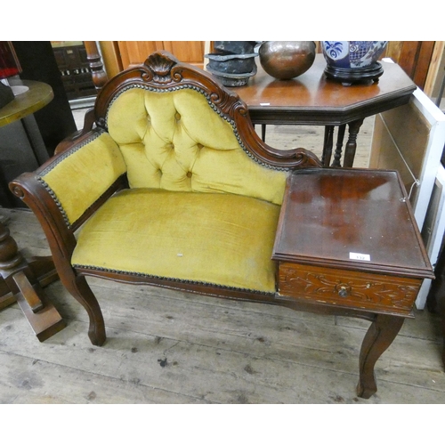 132 - A reproduction mahogany telephone seat with gold Dralon upholstery