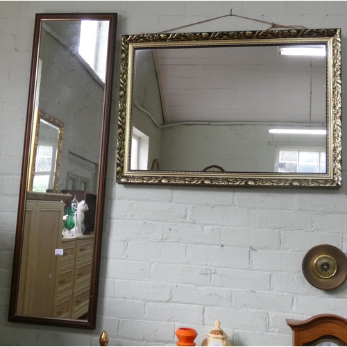 139 - A large gilt framed wall mirror and a long dressing mirror